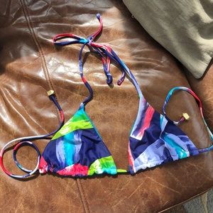 Size small Multi color and bright blue reversible bikini top